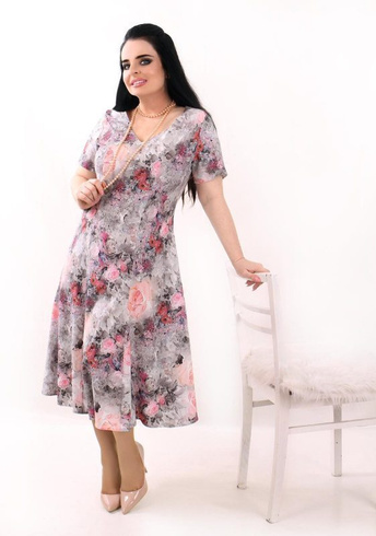 Rozkloszowana sukienka w kwiaty w pastelowych kolorach - Nela